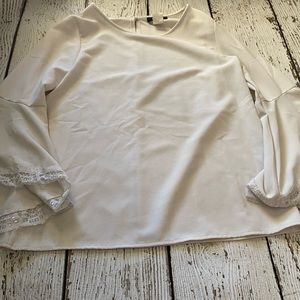 i have a size small and medium in these really pretty white blouses